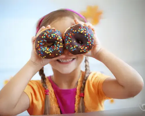 child with a donut